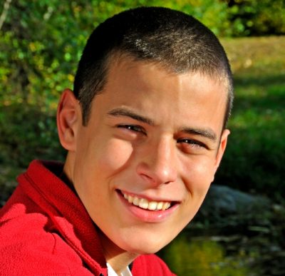 boy-outside-red-shirt-close-purchased